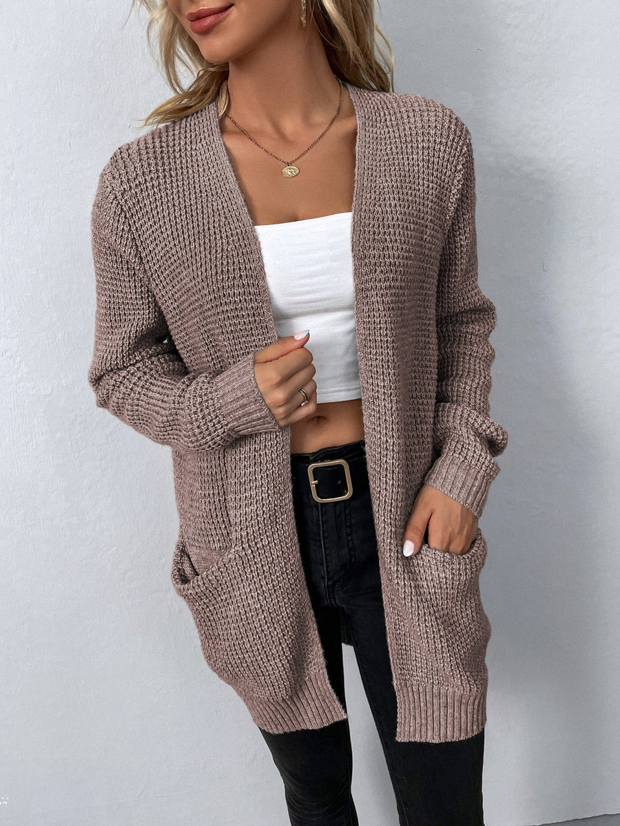 Dame cardigan med åben front, ideel til lag-på-lag. Skaber en afslappet, men elegant hverdagsstil.