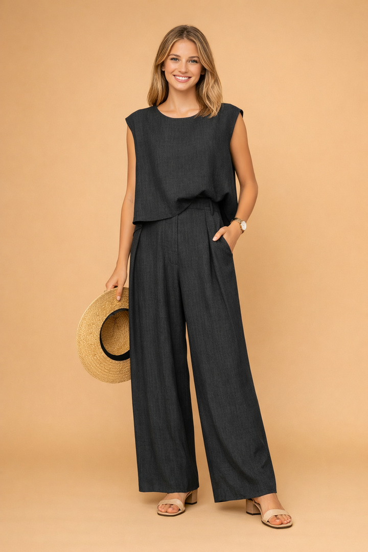 Stilfuld jumpsuit til kvinder. Alsidig mode med o-hals og brede bukser. Komfortabel bomuld/hør heldragt til sommer.