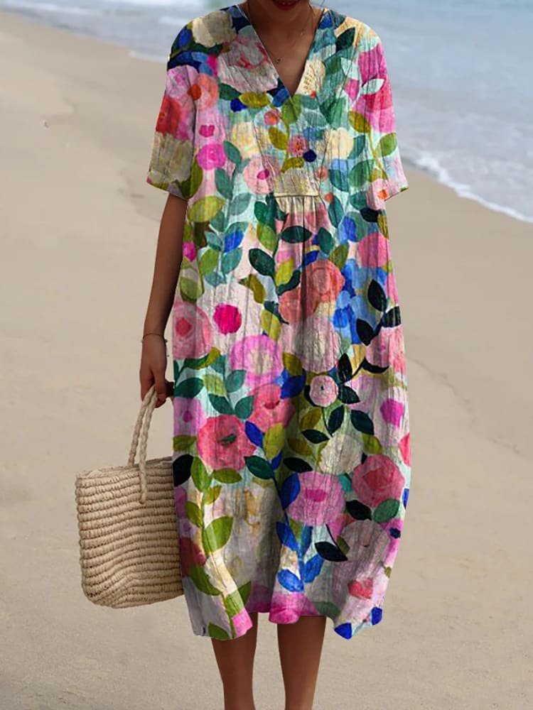 Afslappet stribet boho midikjole til kvinder med V-hals, ideel som sommer- eller strandkjole.