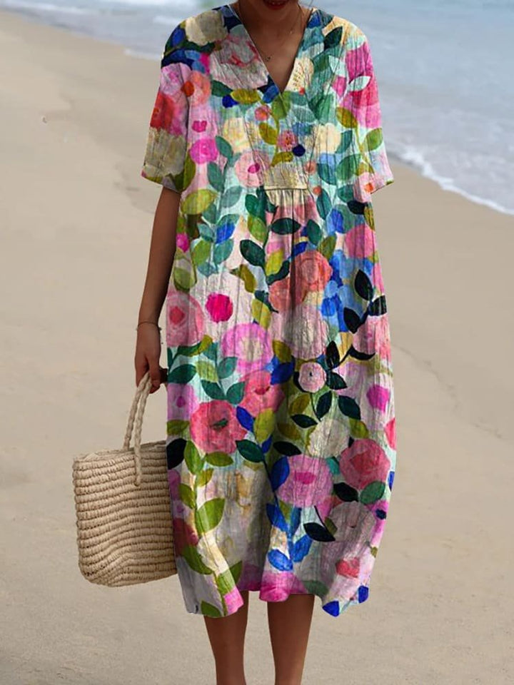 Afslappet stribet boho midikjole til kvinder med V-hals, ideel som sommer- eller strandkjole.