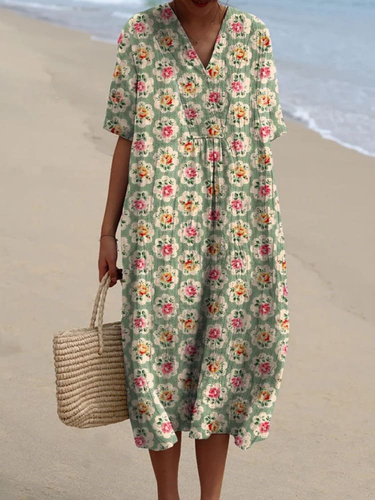 Luftig, stribet boho midikjole til kvinder med V-hals, ideel til varme sommerdage.