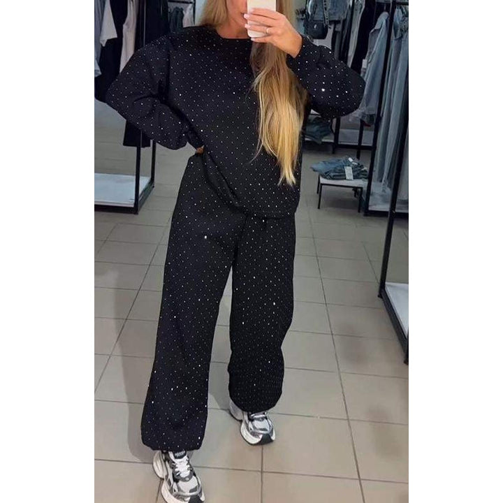Kvinders 2-delt afslappet sæt med høj talje, perfekt til hverdagskomfort og stilfuldt fritidstøj. Blødt loungewear.