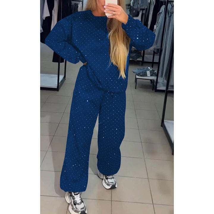 Elegant kvinders 2-delt loungewear sæt med højtaljede bukser. Perfekt til afslapning og moderne fritidstøj.