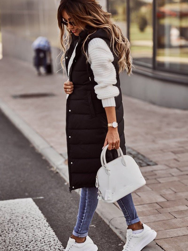 Stilfuld lang quiltet vest til kvinder. Varmt overtøj til efterår/vinter, perfekt til et moderne lag-på-lag look.