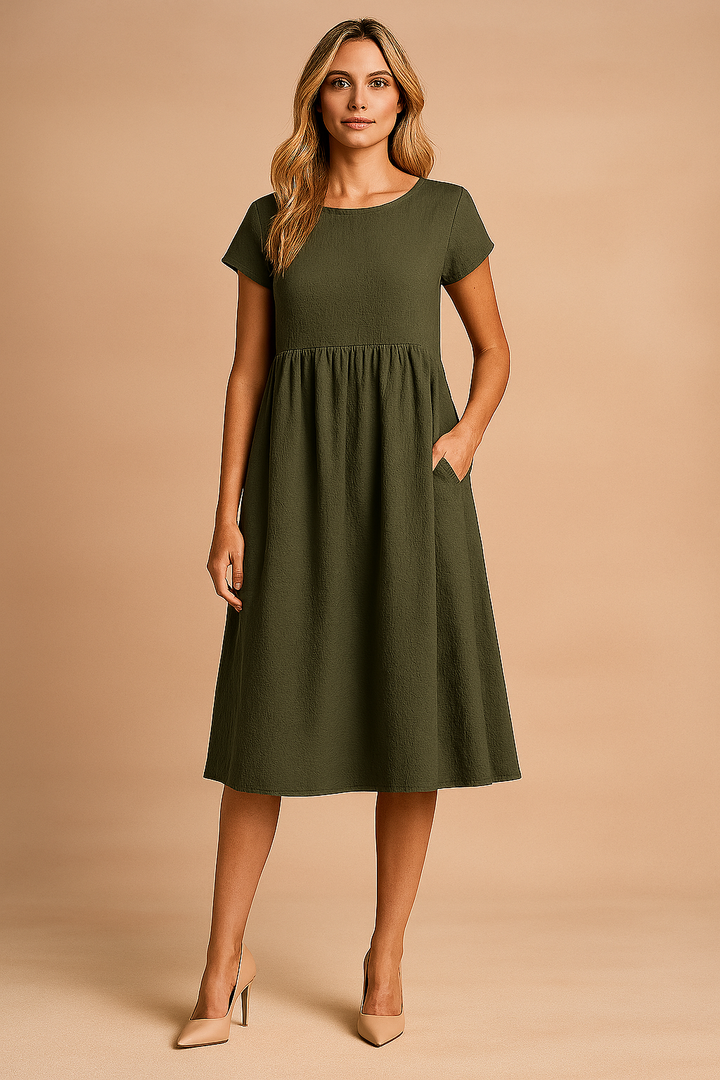 Elegant og afslappet sommer midikjole for kvinder, ideel til ferie og hverdagsbrug.