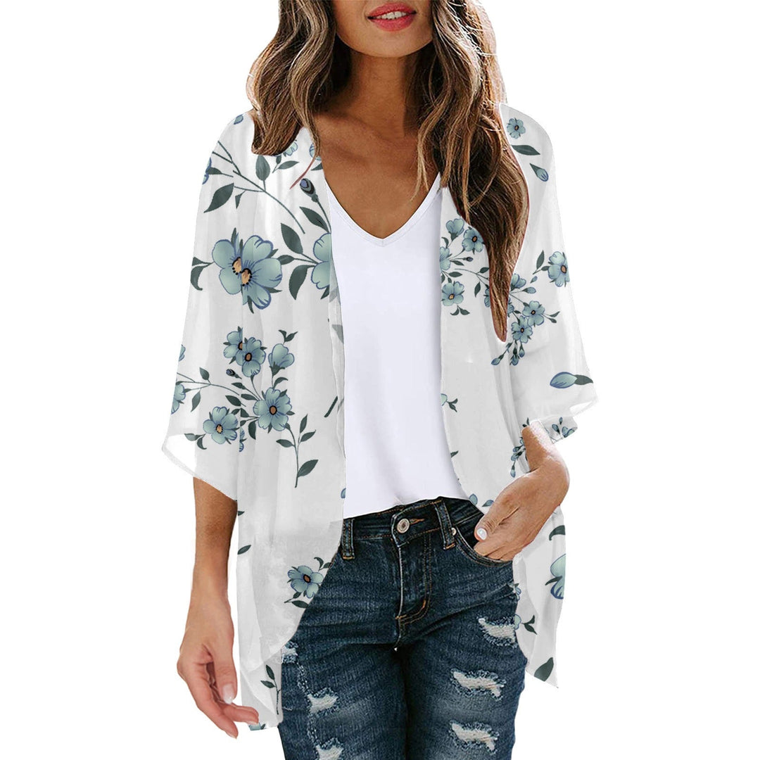Alsidig kimono jakke med blomsterprint, perfekt som let jakke eller elegant bluse.