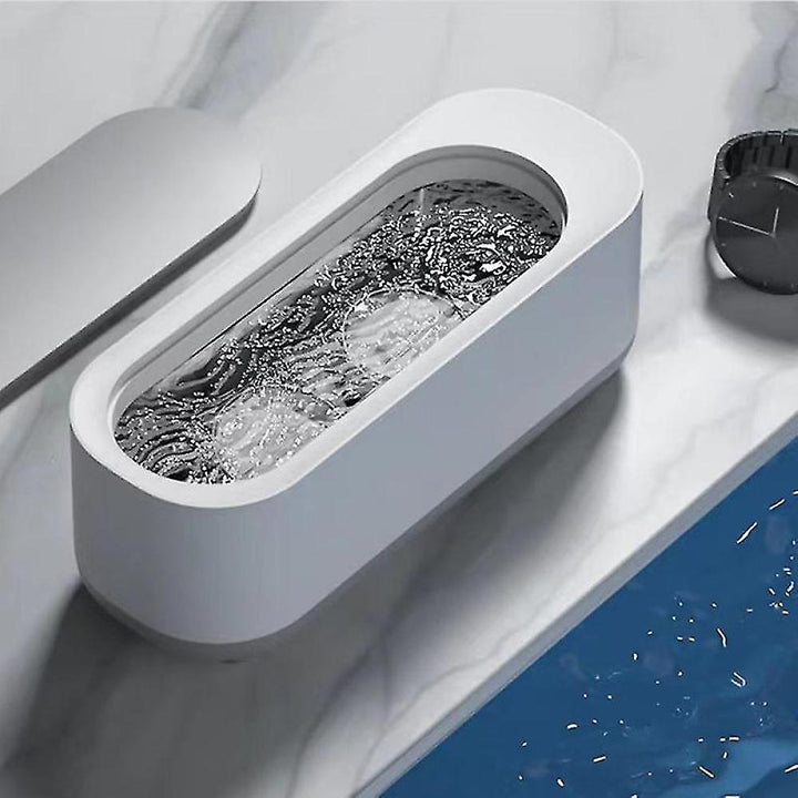 Smart PureShine ultralydsrenser til nem rengøring af smykker, briller, ure. Ideel til et moderne smarte hjem.