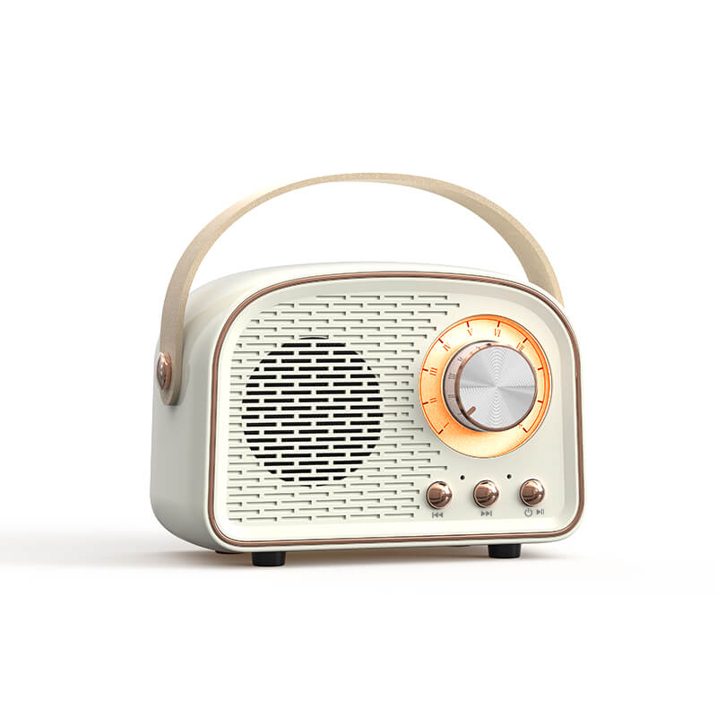 Bærbar retro Bluetooth højttaler med FM radio og trådløs musikstreaming, ideel til alle rum.