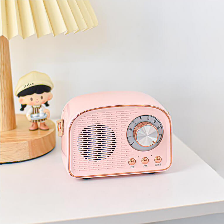 Vintage design Bluetooth højttaler med FM radio for klar lyd og nem musikstreaming. Perfekt gaveide.