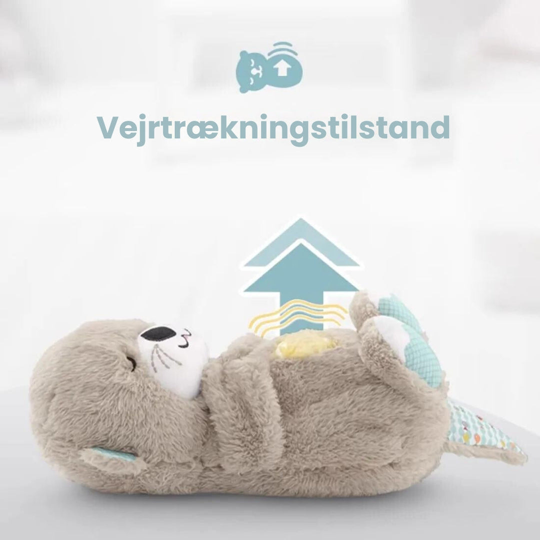 Sød odder sovebamse i blødt plys, en beroligende følgesvend for babyer og små børn.