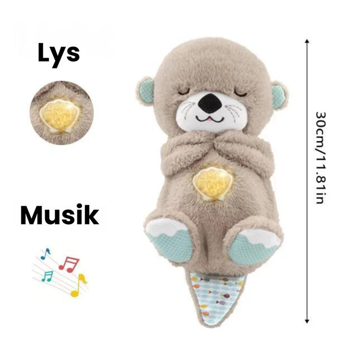 Blød plys odder nussebamse, ideel til babyer der trænger til en tryg og kær sovemakker.