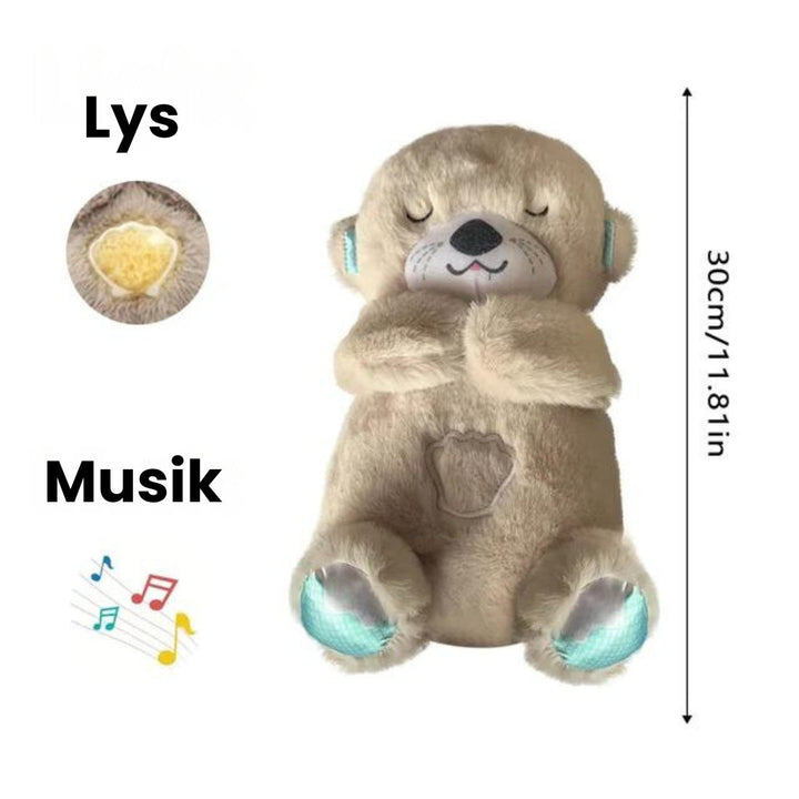 CozyDream's bløde odder, en uundværlig beroligende ven for babyer og småbørn i plys.