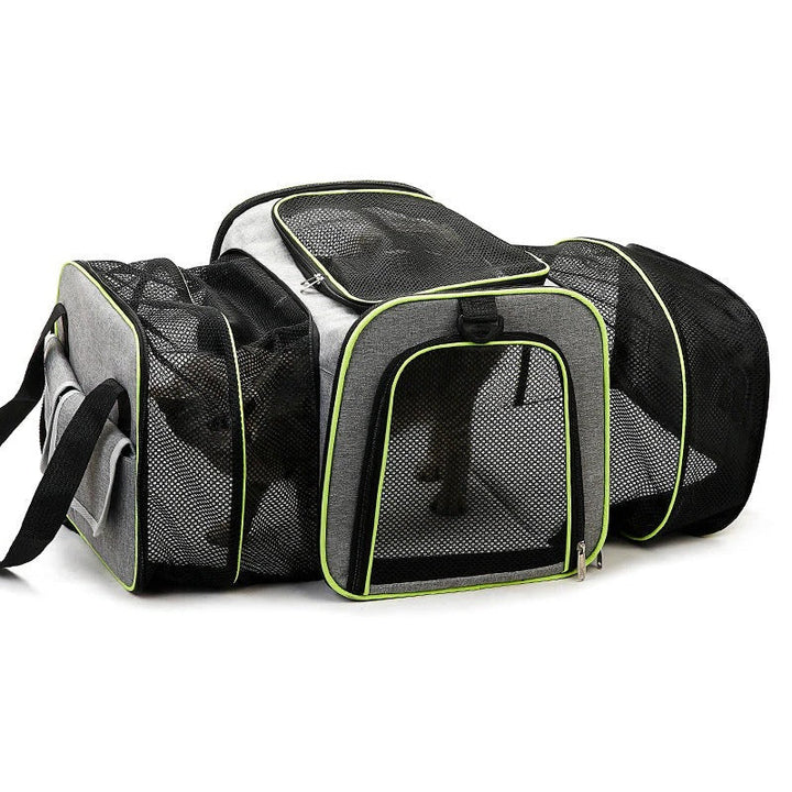 Robust sammenfoldelig hundetaske med netvinduer, perfekt til komfortabel og sikker transport af din hund.