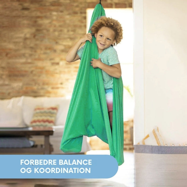 Blød sansegynge for børn. Fremmer afslapning, balance og koordination. Ideel for sensorisk terapi.