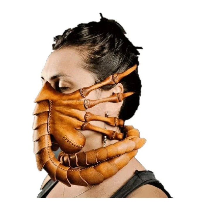 Uhyggelig Alien Facehugger maske i latex, designet til at skræmme til Halloween og kostumefester.