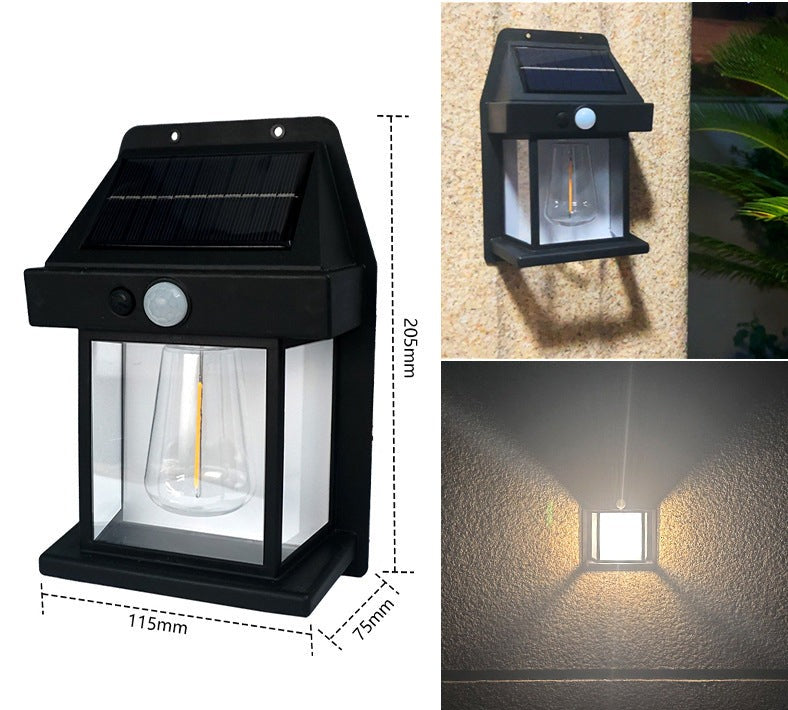 Moderne solcelle væglampe. Sort/hvid med bevægelsessensor og LED lys. Ideel til facade og terrasselampe.