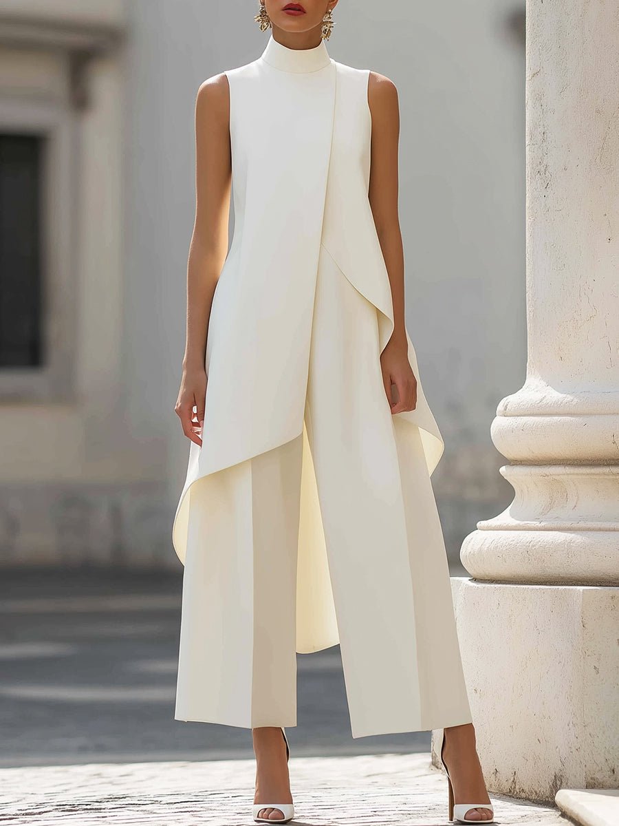Sort asymmetrisk high-neck ærmeløst dame buksesæt med vide ben. Elegant moderne kontor tøj.