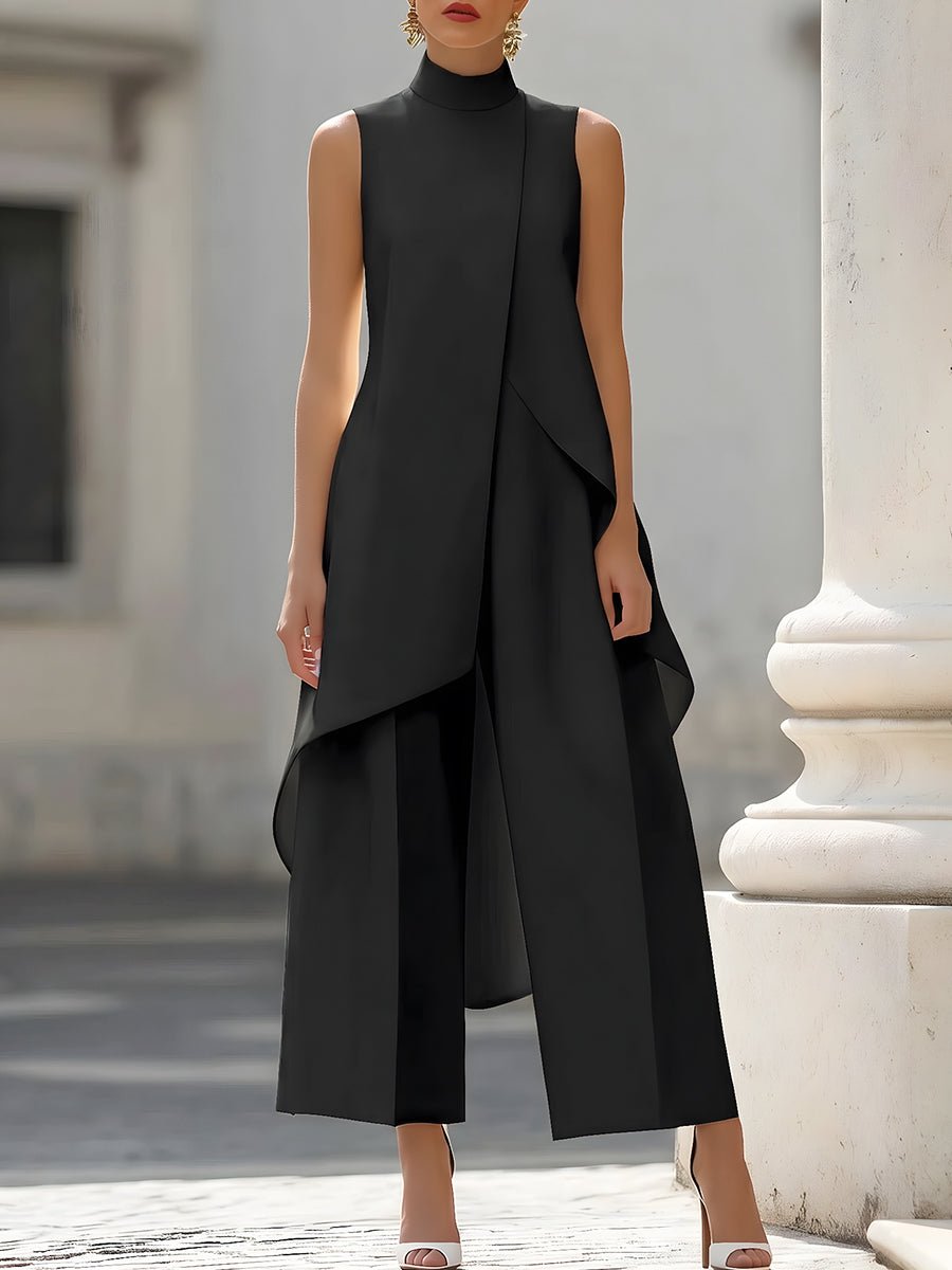 Lyserødt wide-leg buksesæt med asymmetrisk high-neck og ærmeløst design. Elegant til kontor.
