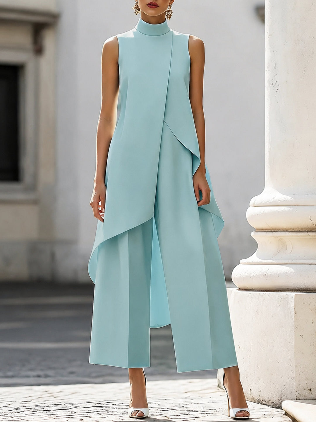 Sort formelt dame buksesæt, asymmetrisk high-neck og wide-leg. Moderne ærmeløs stil til kontor.