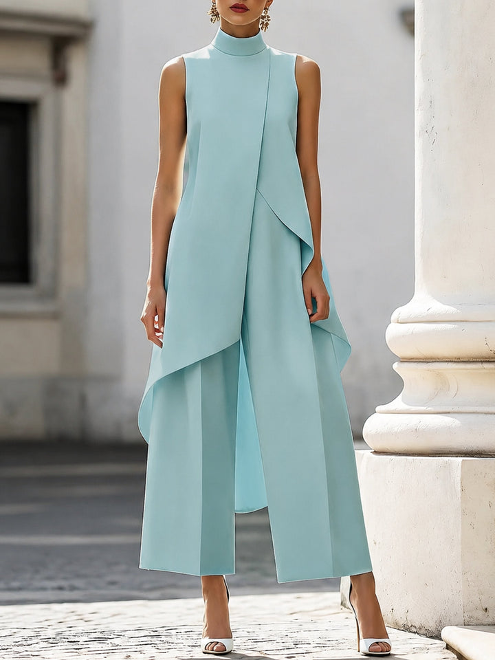 Sort formelt dame buksesæt, asymmetrisk high-neck og wide-leg. Moderne ærmeløs stil til kontor.