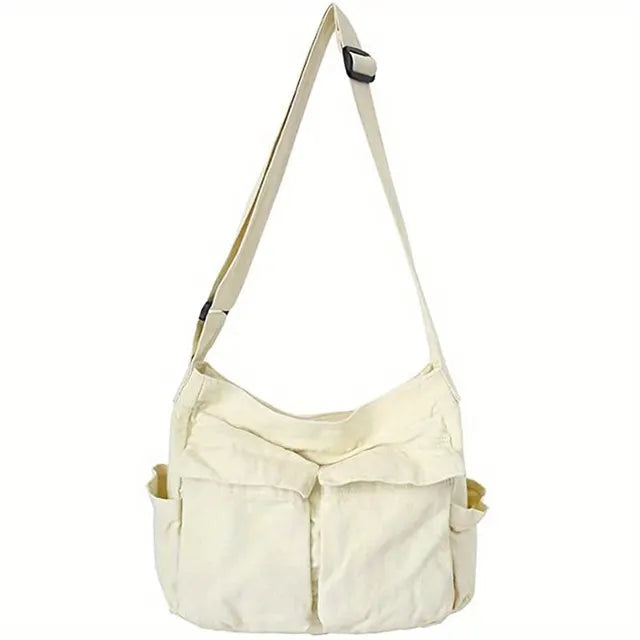 Stilfuld grøn kvindetaske med klap. Alsidig skuldertaske og crossbody, perfekt til en moderne hverdag.