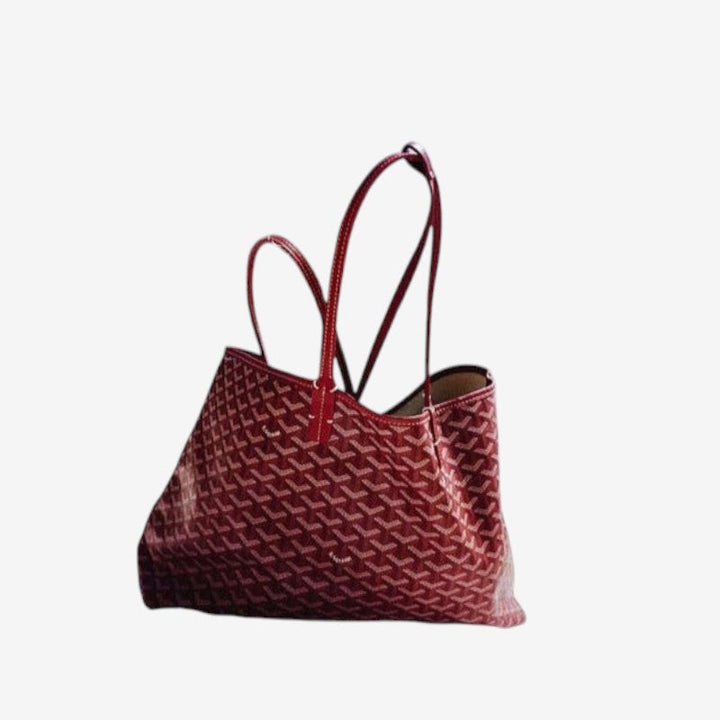 Elegant dametaske/skuldertaske designet som computertaske til hverdag og kontorbrug, smart og funktionel.