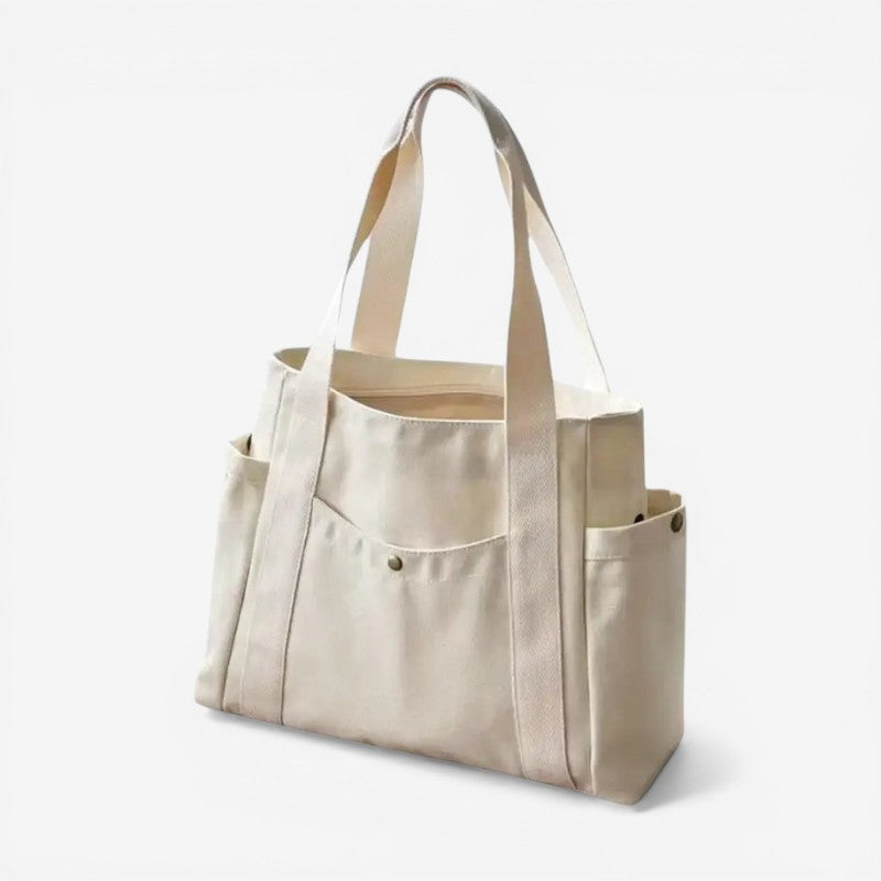 Stilfuld dame tote taske med multi rum, ideel til organiseret hverdag og arbejde.