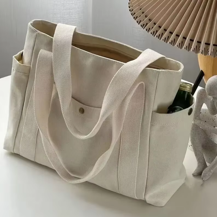 Stilfuld pendlertaske: Dame tote taske med multi rum. En praktisk og moderne skuldertaske til hverdagsbrug.