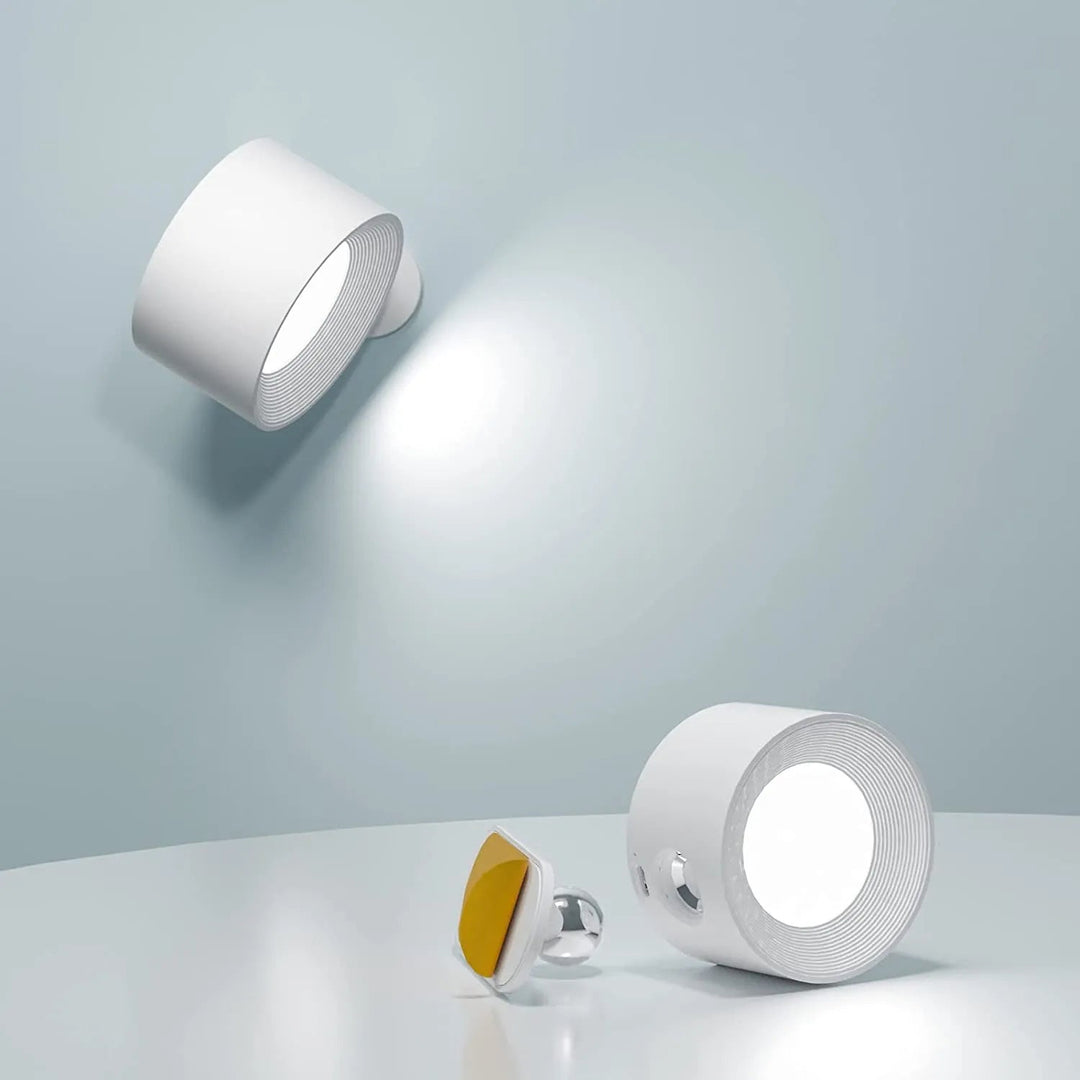 Trådløs væglampe m/ 360° rotation i stilrent design. Fleksibel dæmpbar belysning til hjemmet.