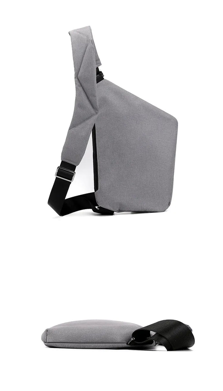 Holdbar mini rejsetaske, unisex crossbody design, med tyverisikring og komfortabel pasform.